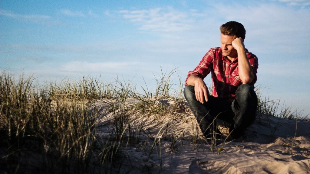 man-on-beach-alone-small-1024x576